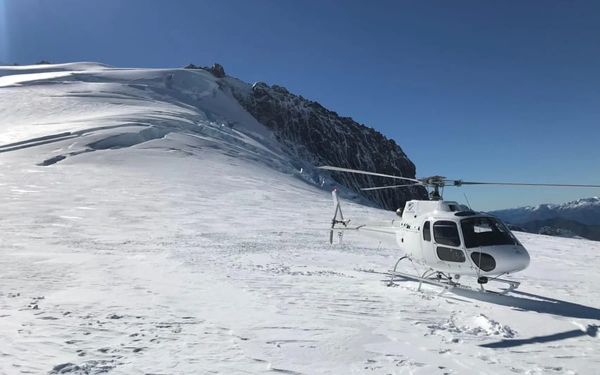 A Wanaka glacier flight banking over the Southern Alps